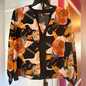 Floral Print Blouse with Orange and Black Accents